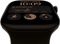 Apple Watch Series 12, vỏ nhôm, màu đồng đậm, mặt đồng hồ Mô-đun, các tổ hợp: thứ và ngày, Bài Tập, các vòng Hoạt Động, Apple Music, mặt ngoài bên phải, Digital Crown, Dây Đeo Thể Thao, màu xanh ô-liu