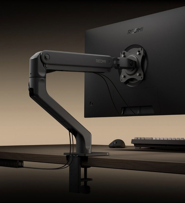REDMI Monitor Arm tích hợp hệ thống đi dây ẩn và ngàm kẹp bàn, giúp khu vực làm việc gọn gàng hơn.